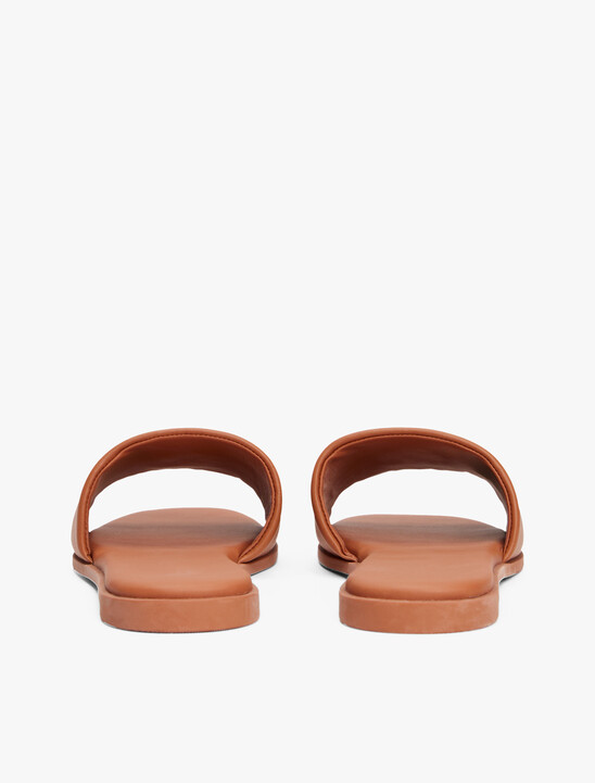 TH Monogram Leather Mules