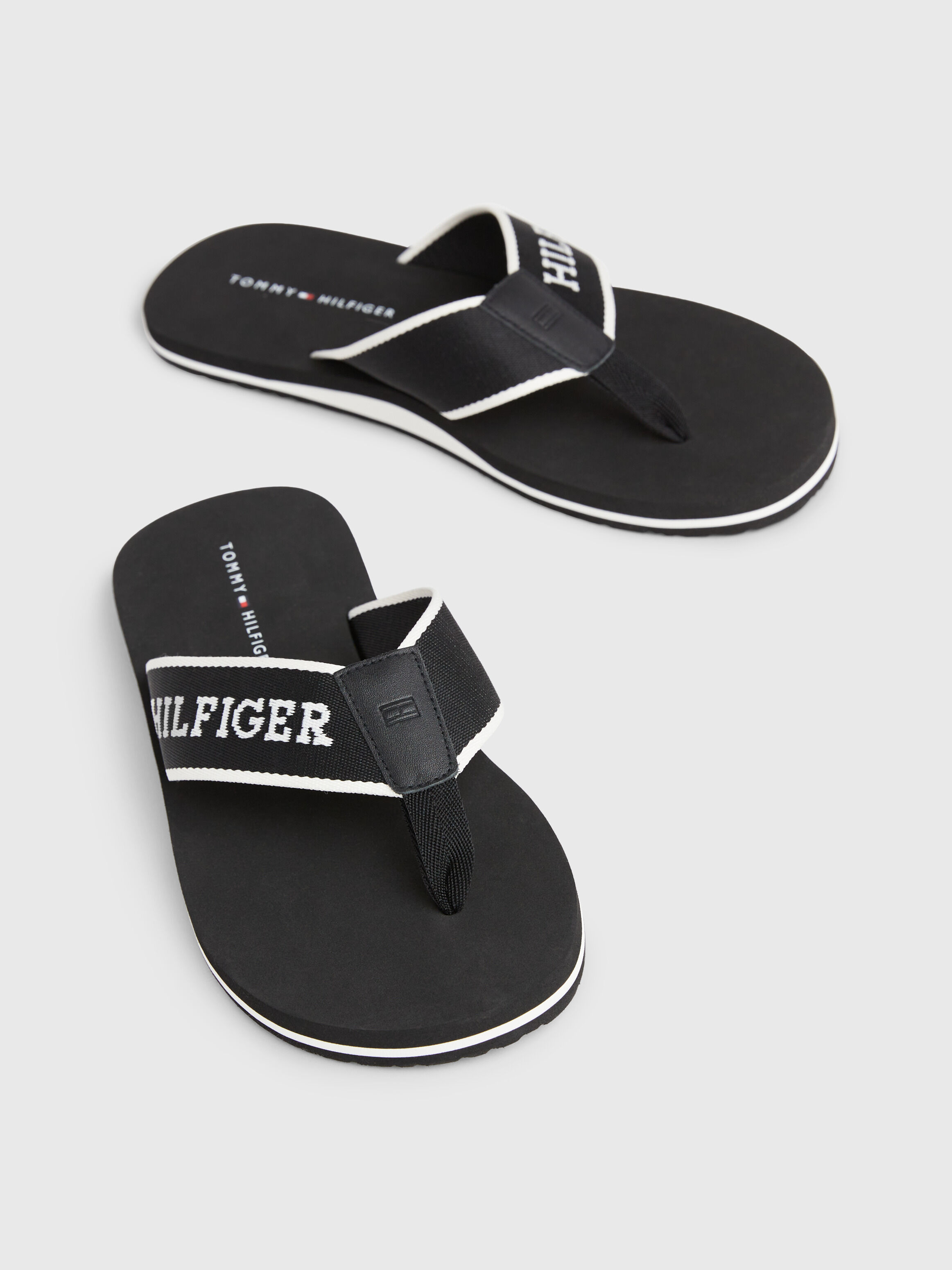 Tommy hilfiger black flip outlet flops