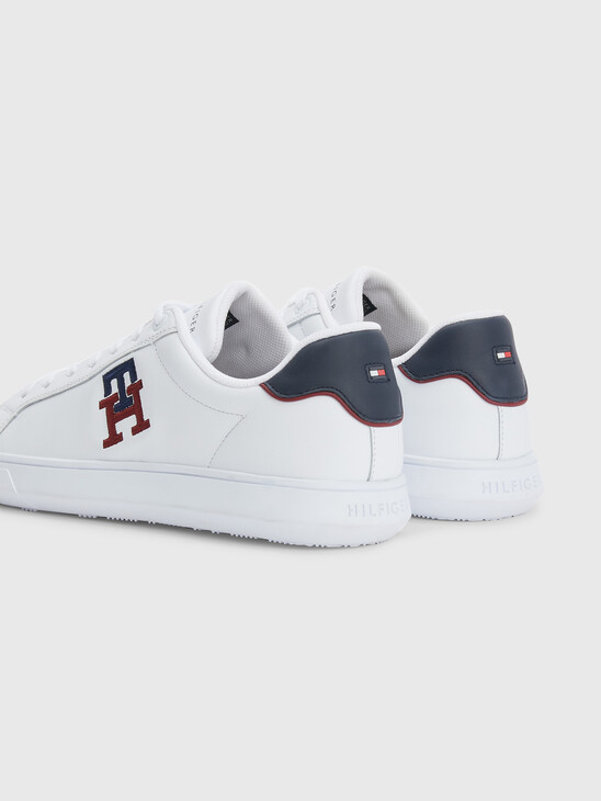 TH MONOGRAM EMBROIDERY LEATHER TRAINERS